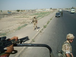 4. A Land Rover patrol carrying out a vehicle check